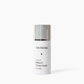 Skincare bottle with silver cap on a white background